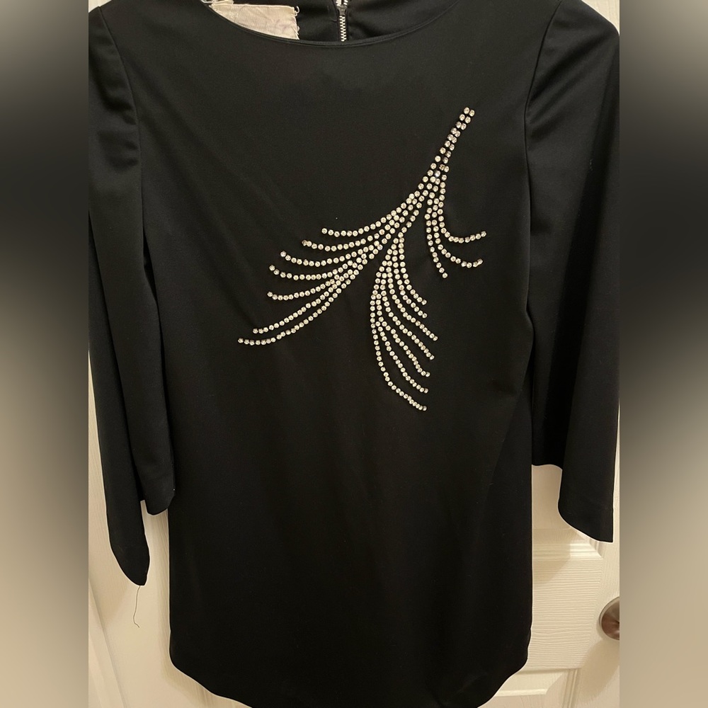 Black tunic top with rhinestone detail